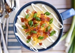 Slow Cooker Loaded Baked Potato Soup ~ a smooth and creamy crock pot soup garnished with a variety of toppings, from sour cream and shredded cheese to crispy bacon and green onions | FiveHeartHome.com