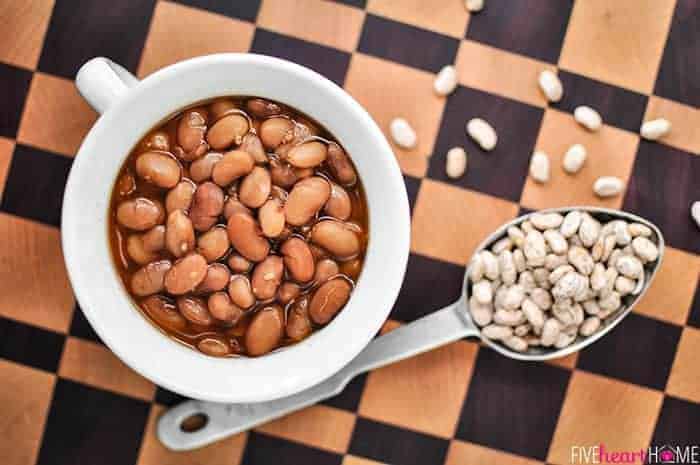 Slow Cooker Ranch Style Beans ~ pinto beans cooked in the crock pot for simple, versatile, delicious ranch beans that are great as a summer side dish with BBQ! | FiveHeartHome.com