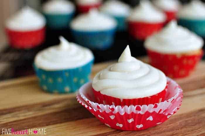 Vanilla Texas Sheet Cake Cupcakes with red and blue cupcake liners.