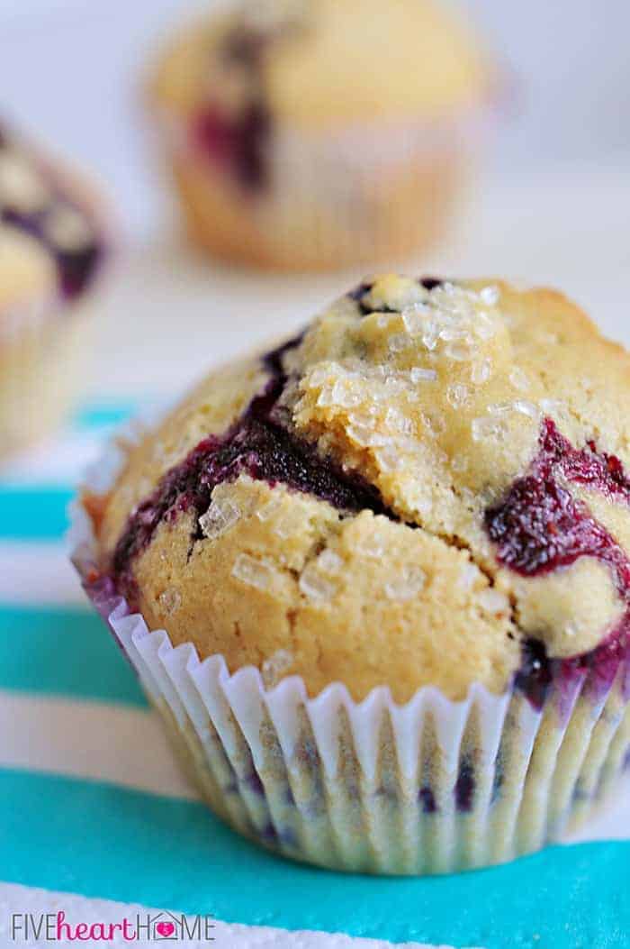 Classic Blueberry Muffins ~ these tender muffins are the BEST...bursting with berries and easy to make for a yummy breakfast or snack! | FiveHeartHome.com Close-up of coarse sparkling sugar sprinkled on top