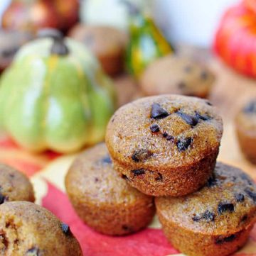 Stack of Pumpkin Chocolate Chip Bread Muffins.