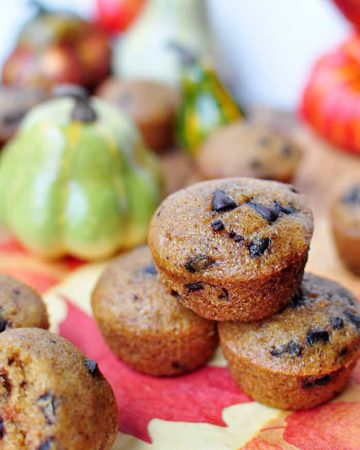 Stack of Pumpkin Chocolate Chip Bread Muffins.
