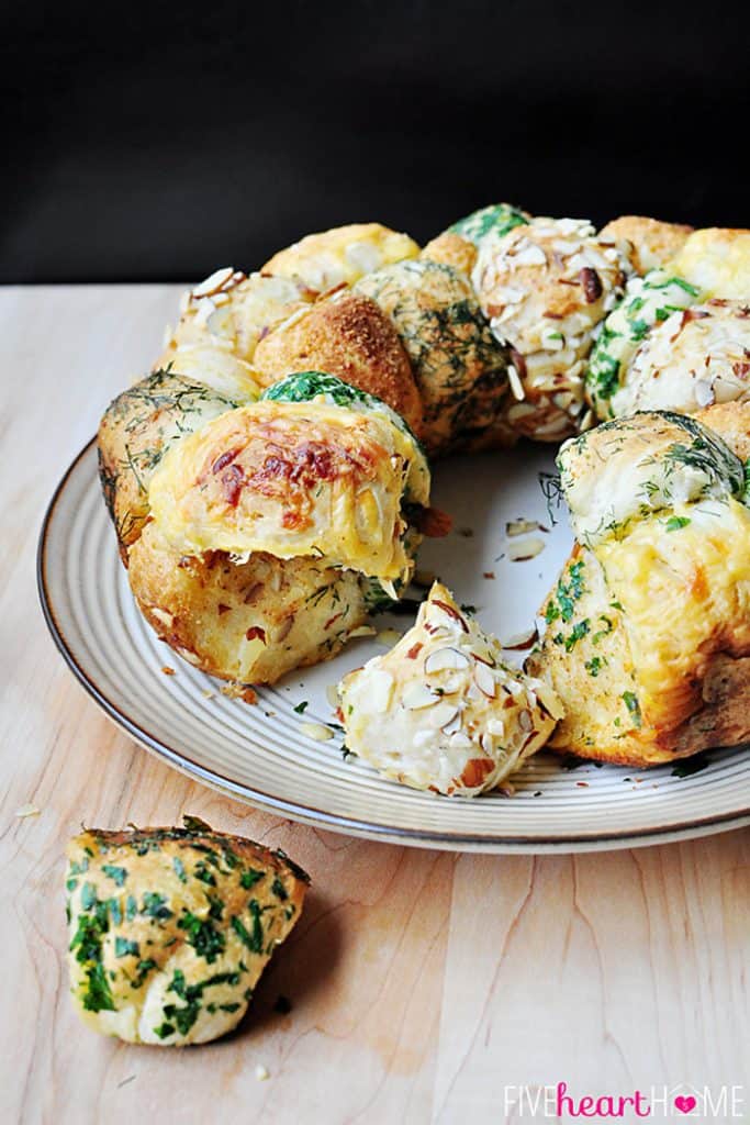 Savory Monkey Bread coated with herbs and cheese on a plate