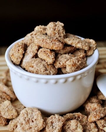White bowl of Cinnamon Sugar Pecans.