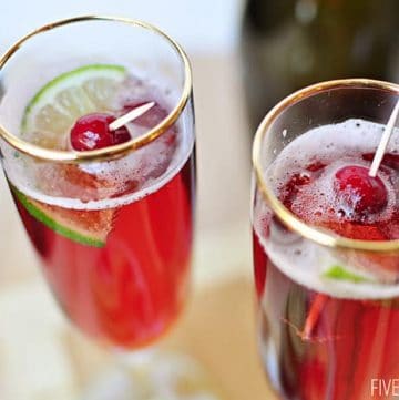 Cranberry Pomegranate Bellinis with Lime ~ can be made with champagne or seltzer, perfect during the holidays or for New Year's | {Five Heart Home}