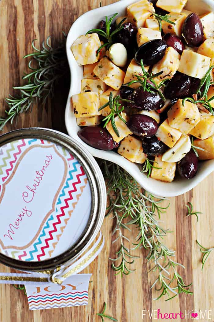 Aerial shot of Marinated Cheese & Olives in a bowl and gift jar.