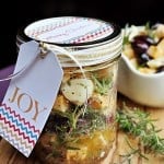 Marinated Cheese in a jar with gift tag.