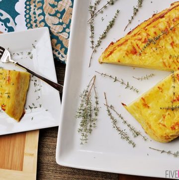 Scalloped Potato Flan with Gruyère and Garlic ~ served overturned and sliced for an elegant presentation | {Five Heart Home}
