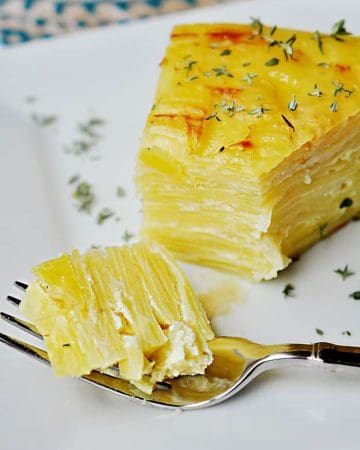 Scalloped Potato Flan with Gruyère and Garlic ~ served overturned and sliced for an elegant presentation | {Five Heart Home}