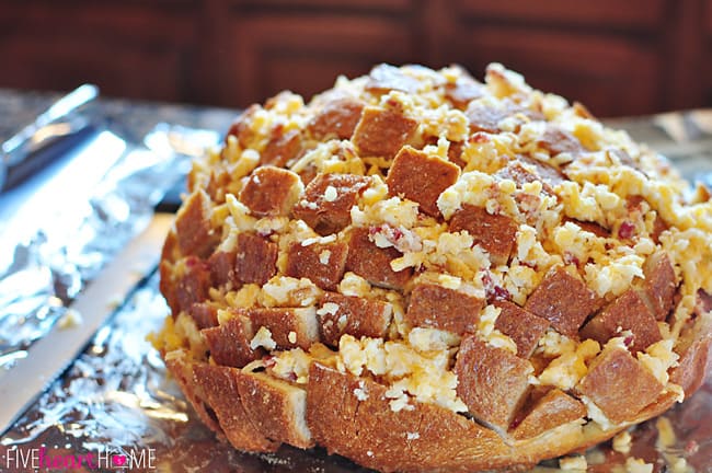 Pull-Apart Bread stuffed with cheese and ready to go into oven.