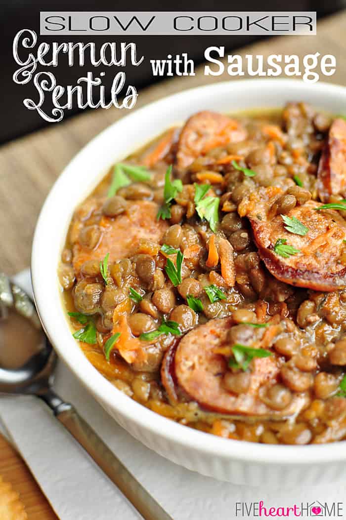 Slow Cooker German Lentil Soup is enhanced with sausage, carrots, and a flavorful broth that simmer the day away in a hearty, comforting, crockpot soup! | fivehearthome.com via @fivehearthome