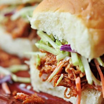 Slow Cooker Root Beer Pulled Pork on a slider.