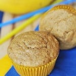 Two Whole Wheat Banana Muffins on blue and yellow napkins