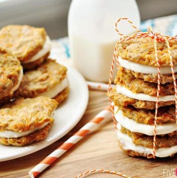 Carrot Cake Sandwich Cookies ~ mini carrot cake whoopie pies filled with cream cheese frosting make an easy, hand-held Easter dessert | FiveHeartHome.com