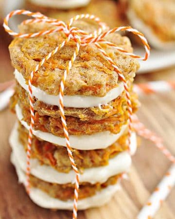 Carrot Cake Sandwich Cookies ~ mini carrot cake whoopie pies filled with cream cheese frosting make an easy, hand-held Easter dessert | FiveHeartHome.com