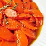 Honey-Glazed Carrots with Thyme and Lemon ~ a perfect spring side dish, and a gorgeous addition to your Easter menu! | FiveHeartHome.com