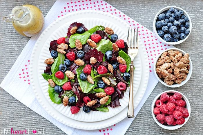 Spring Salad with Mixed Berries, Candied Almonds, and Honey Citrus Vinaigrette ~ a beautiful, delicious salad with vibrant flavors and varied textures | FiveHeartHome.com