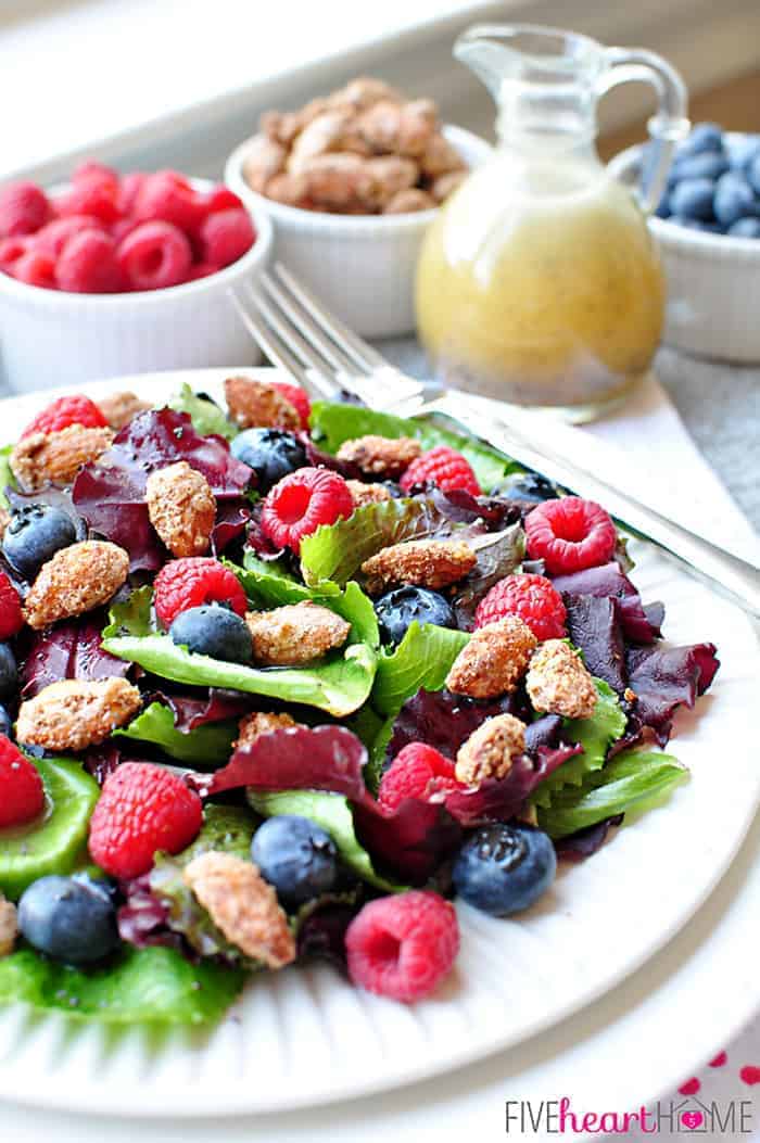 Spring Salad with Mixed Berries, Candied Almonds, and Honey Citrus Vinaigrette ~ a beautiful, delicious salad with vibrant flavors and varied textures | FiveHeartHome.com