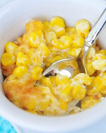 Easy Creamed Corn with Parmesan ~ creamy, decadent corn topped with Parmesan and baked until bubbly | FiveHeartHome.com