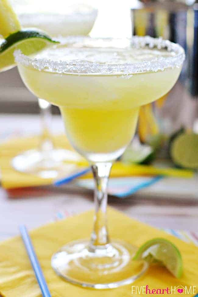 Fresh Pineapple Margaritas ~ made with fresh lime juice and pineapple purée, these are perfect for celebrating Cinco de Mayo or cooling off all summer long! | FiveHeartHome.com