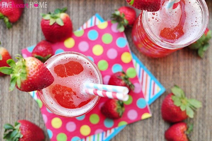 Aerial view of glasses and berries on table.