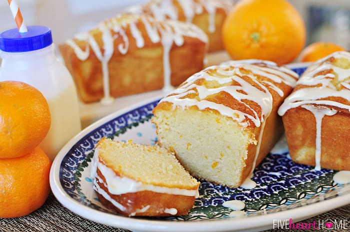 Orange Pound Cake sliced on a platter.