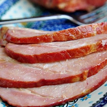 Slow Cooker Brown Sugar Ham sliced on a platter.