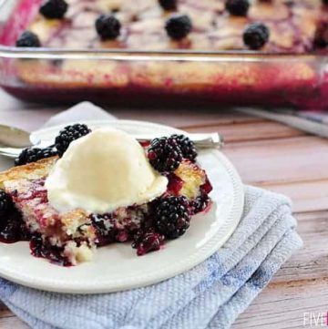 Homemade Blackberry Cobbler ~ a simple, scrumptious dessert featuring plump, tart berries ribboning a layer of sweet, tender cake. And don't forget the vanilla ice cream! | FiveHeartHome.com