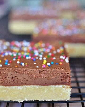 Sugar Cookie Bars with Chocolate Buttercream ~ bars are quicker to make than individual cookies, and decadent frosting puts them over the top! | FiveHeartHome.com