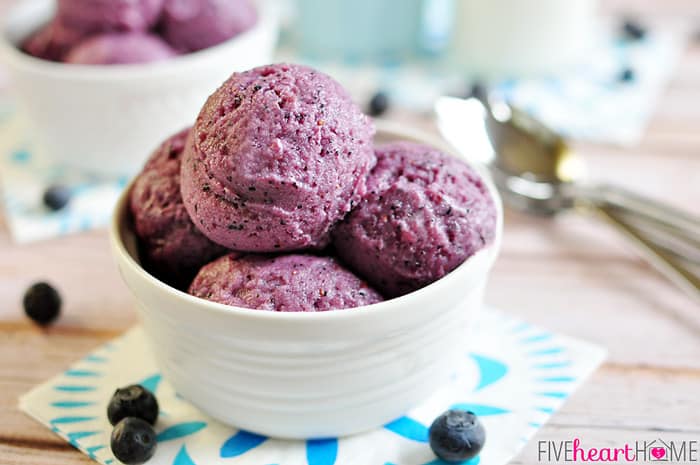 Four Perfect Scoops of Blueberry Buttermilk Sherbet in a Ridged White Bowl