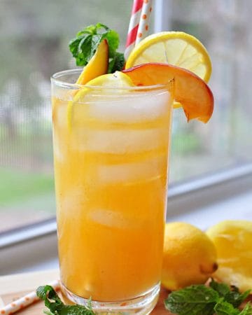 Minty Peach Lemonade ~ homemade lemonade meets mint simple syrup and peach puree in this refreshing summertime drink | FiveHeartHome.com
