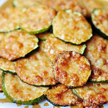 Baked Parmesan Zucchini Rounds ~ you're just 2 ingredients away from a quick and easy, delicious summer side dish! | FiveHeartHome.com