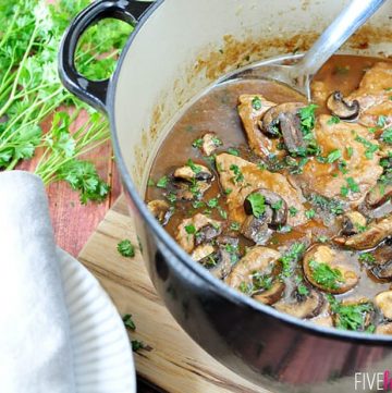 Aerial View of Pork Tenderloin with Mushroom Gravy in a large pot.