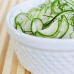 Tangy Cucumber Salad with Fresh Dill ~ thinly-sliced cucumbers in a simple, sweet-and-sour dressing make for a refreshing summer side | FiveHeartHome.com
