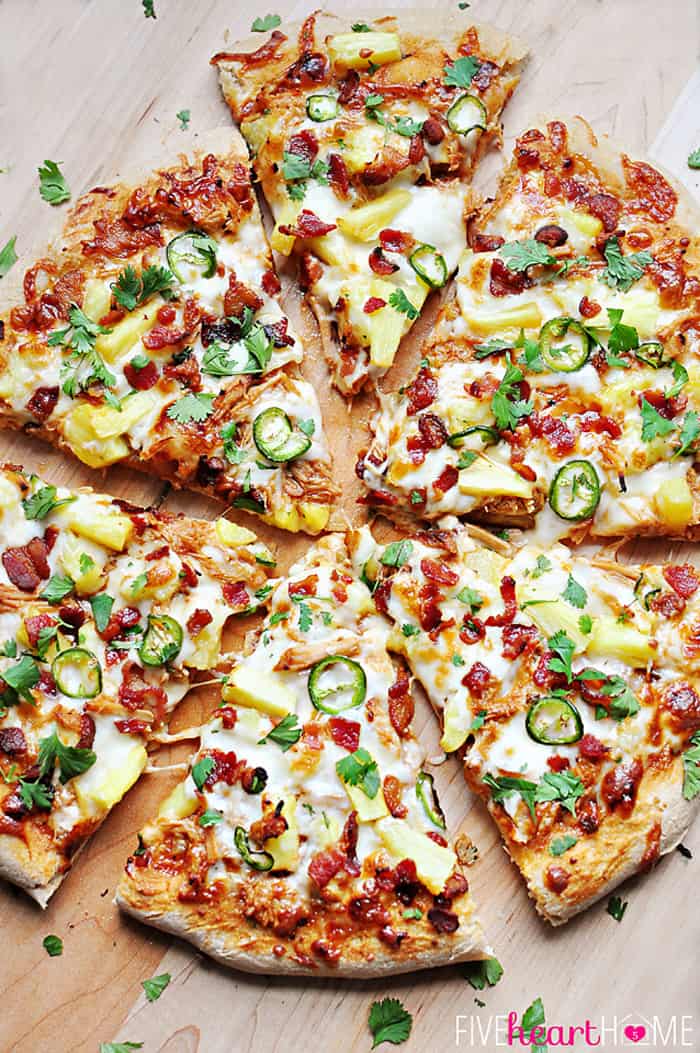 Aerial View of Six Sliced of Pizza on Wood Cutting Board Ready to Serve! 