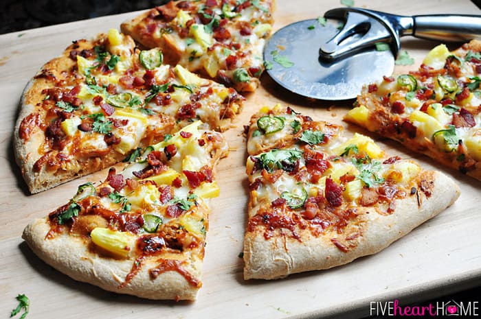 Sliced Pizza on Cutting Board 