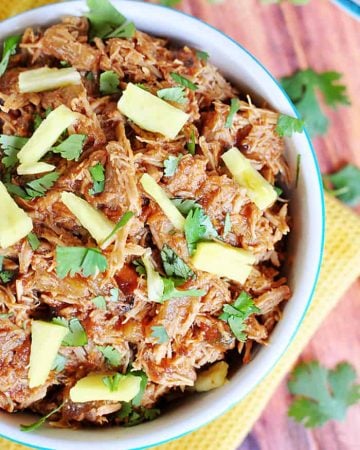Slow Cooker Pineapple Pulled Pork with Pineapple BBQ Sauce ~ use on tacos, quesadillas, pizza, nachos, and more! | FiveHeartHome.com