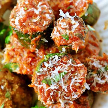 Close-up of Zucchini Marinara piled on plate.