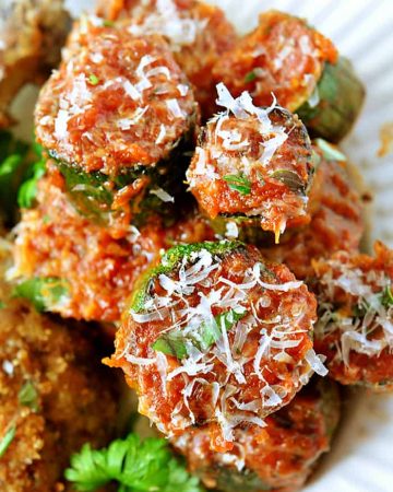 Close-up of Zucchini Marinara piled on plate.