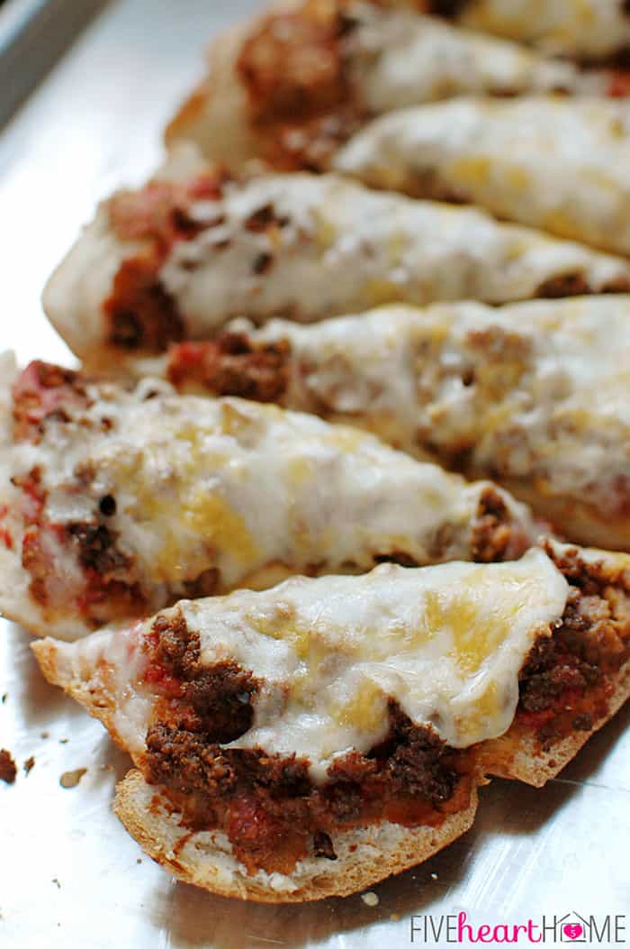 Slices of Pizza with Refried Beans, Taco Meat and Melted Cheese 