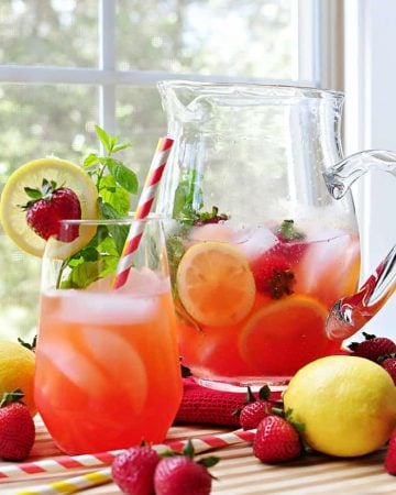 Strawberry Lemonade Mojitos {or} Faux-jitos ~ with fresh strawberries, lemon juice, and mint simple syrup; replace the rum with seltzer for non-alcoholic spritzer | FiveHeartHome.com