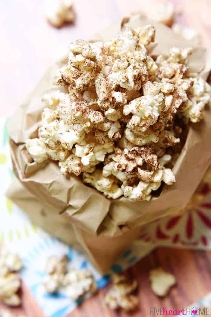 Aerial View with Popcorn Overflowing from Brown Paper Bag 