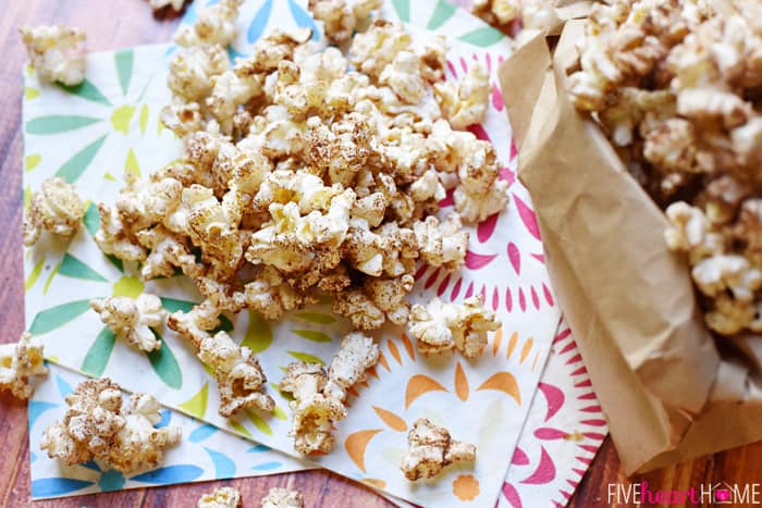 Brown Butter Cinnamon Sugar Popcorn Served in a Paper Bag and on Decorative Napkins 