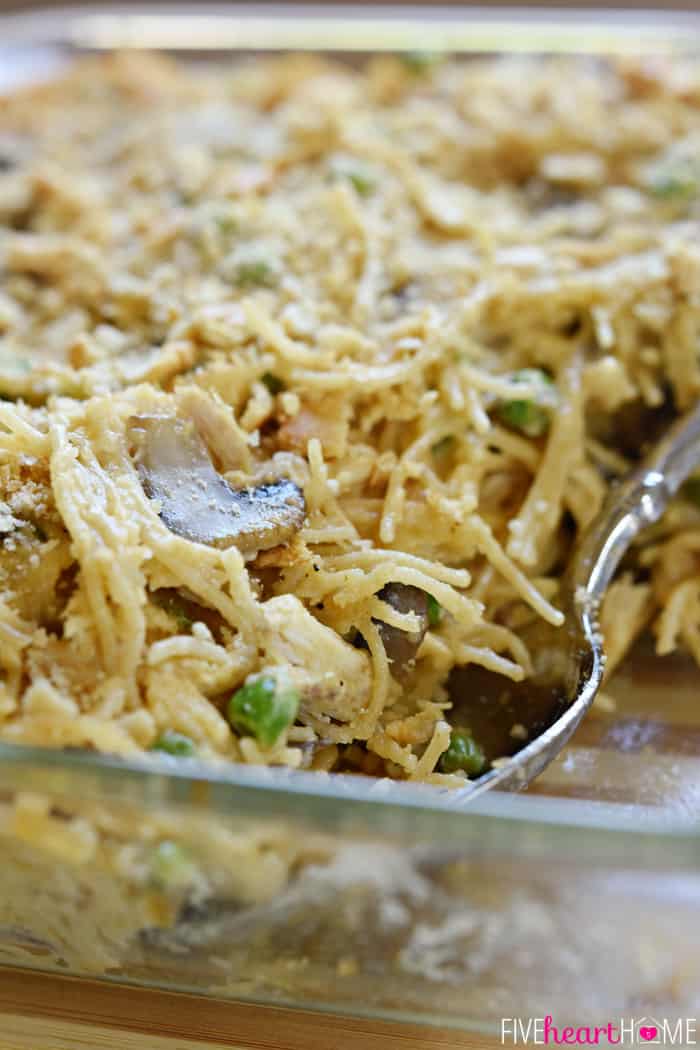 Close-up of serving spoon scooping from baking dish.