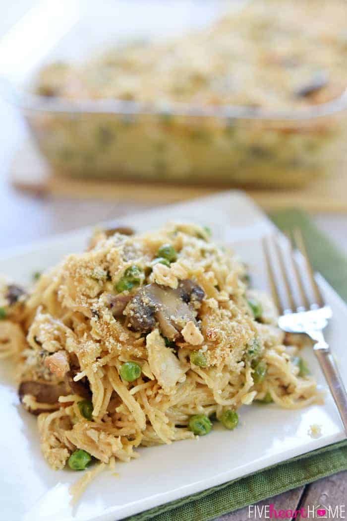 Cheesy Chicken Spaghetti on plate with fork.