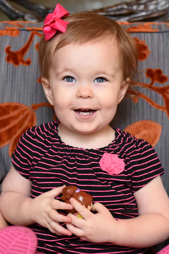 Toddler with pink bow.