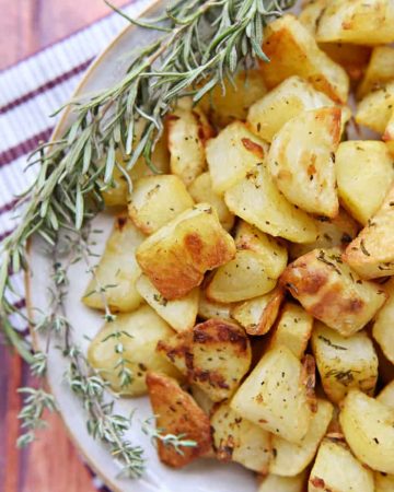 Garlic and Herb Roasted Potatoes ~ a simple, delicious side dish flavored with fresh rosemary and thyme | FiveHeartHome.com