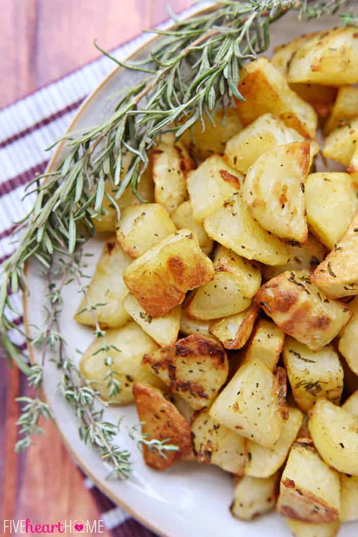 Aerial View on White Platter with Fresh Rosemary and Thyme 