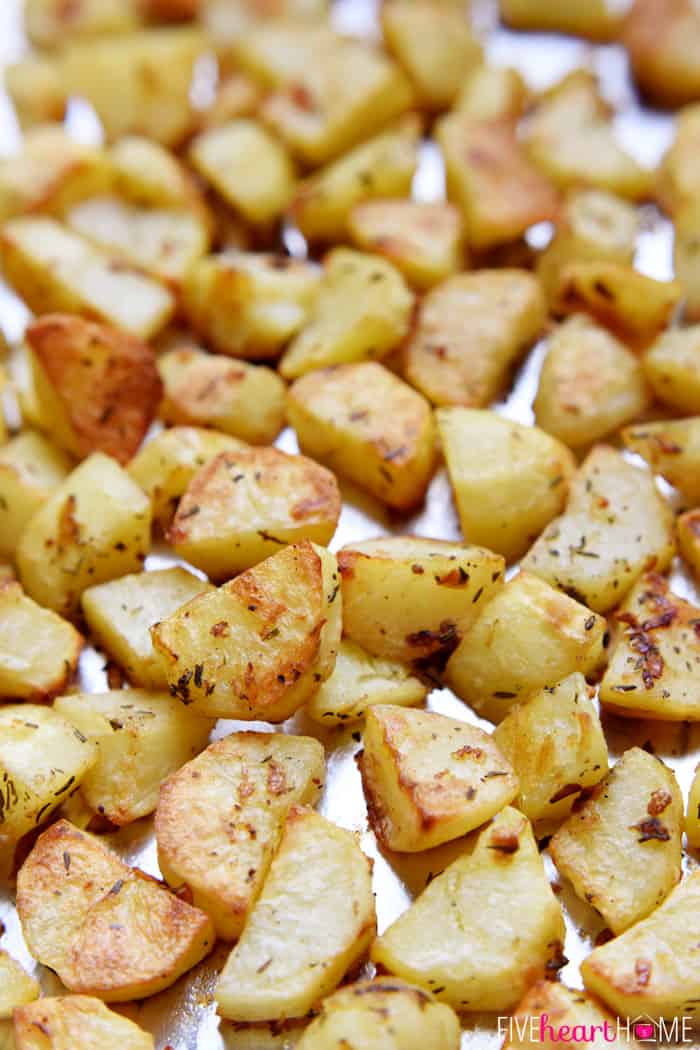 Garlic and Herb Roasted Potatoes on Baking Sheet Fresh from the Oven 