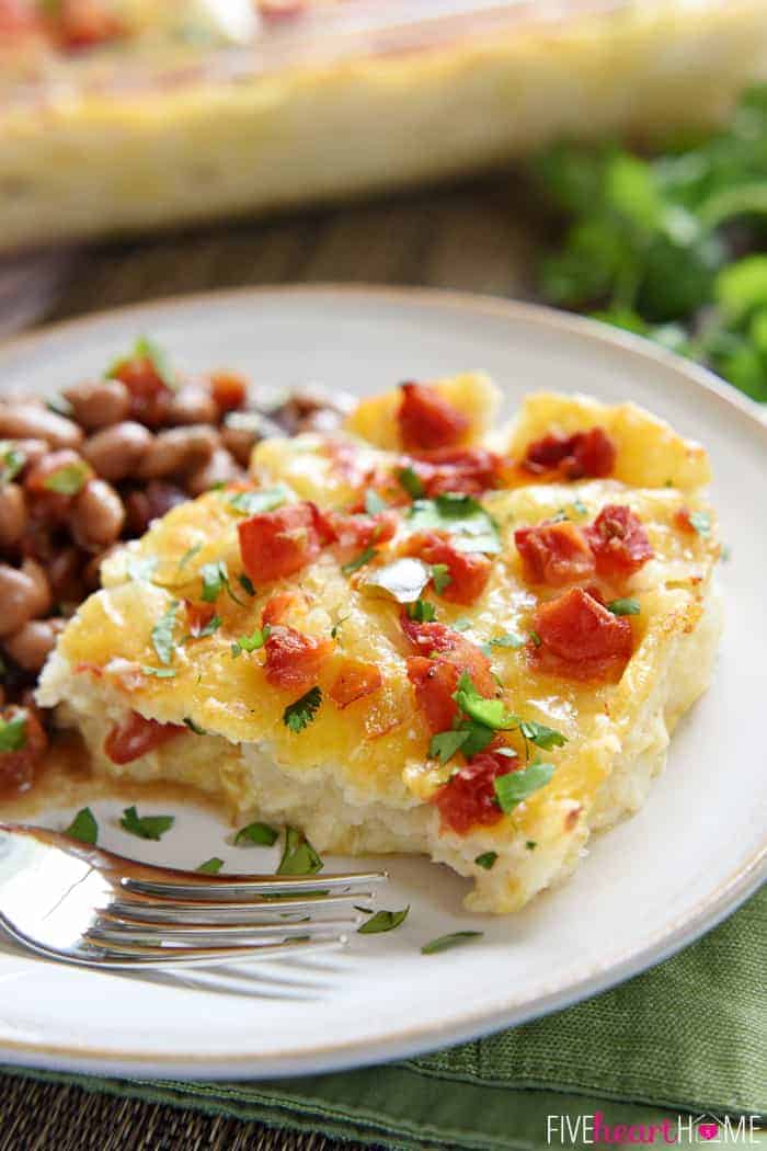 Serving of King Ranch Chicken Casserole on plate with beans.